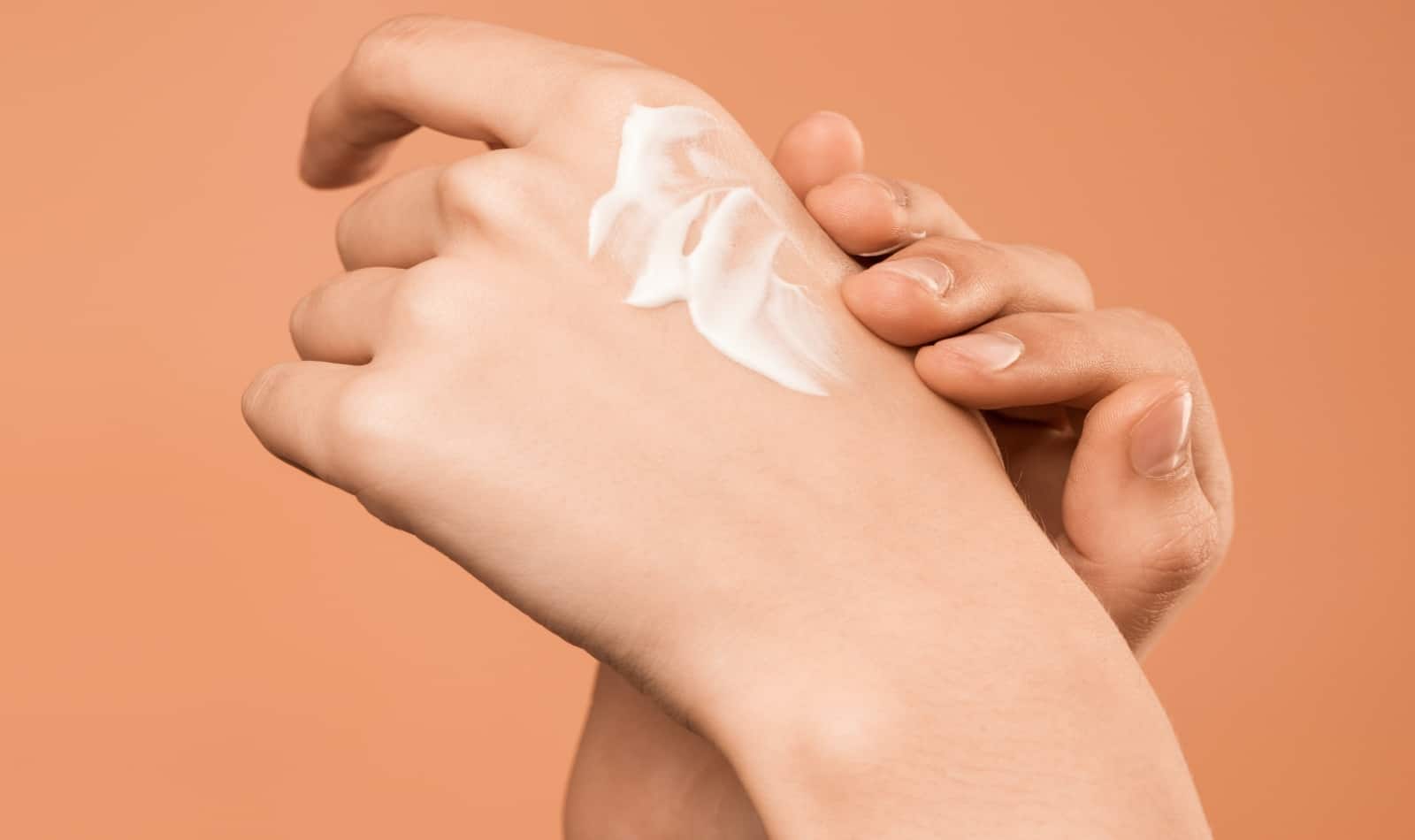 applying a hand cream with aquaphor and eucerin