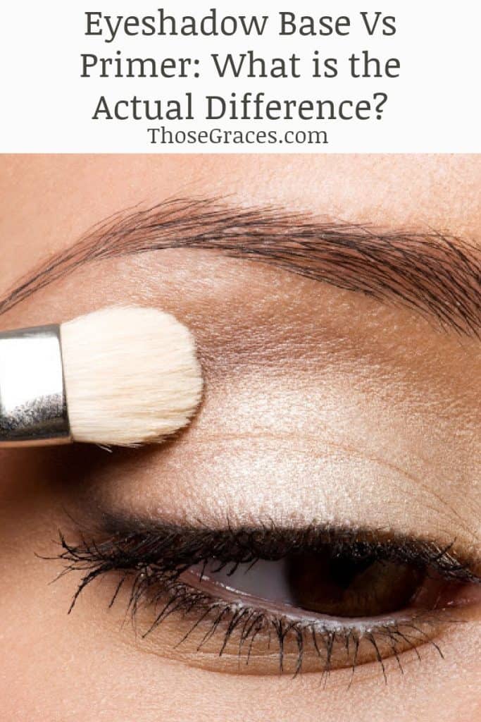 Woman applying sparkly gold eye shadow base with a white makeup brush