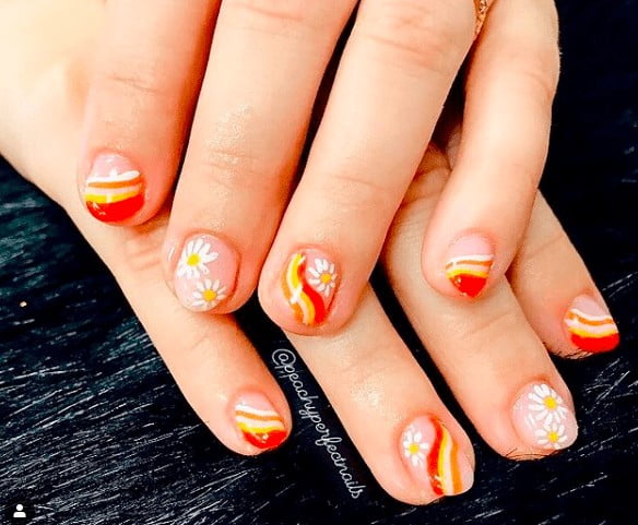 orange and yellow flower indie nail design