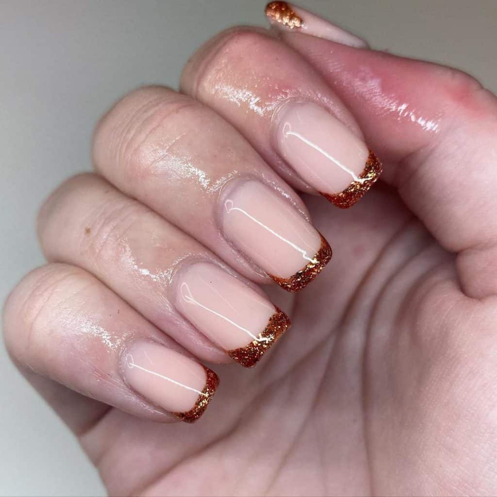 nude pink with glitter tips