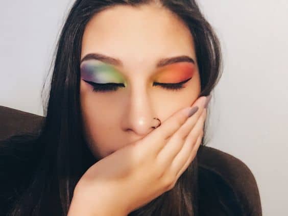 take me back to brazil looks: a beautiful lady with colorful eyeshadows