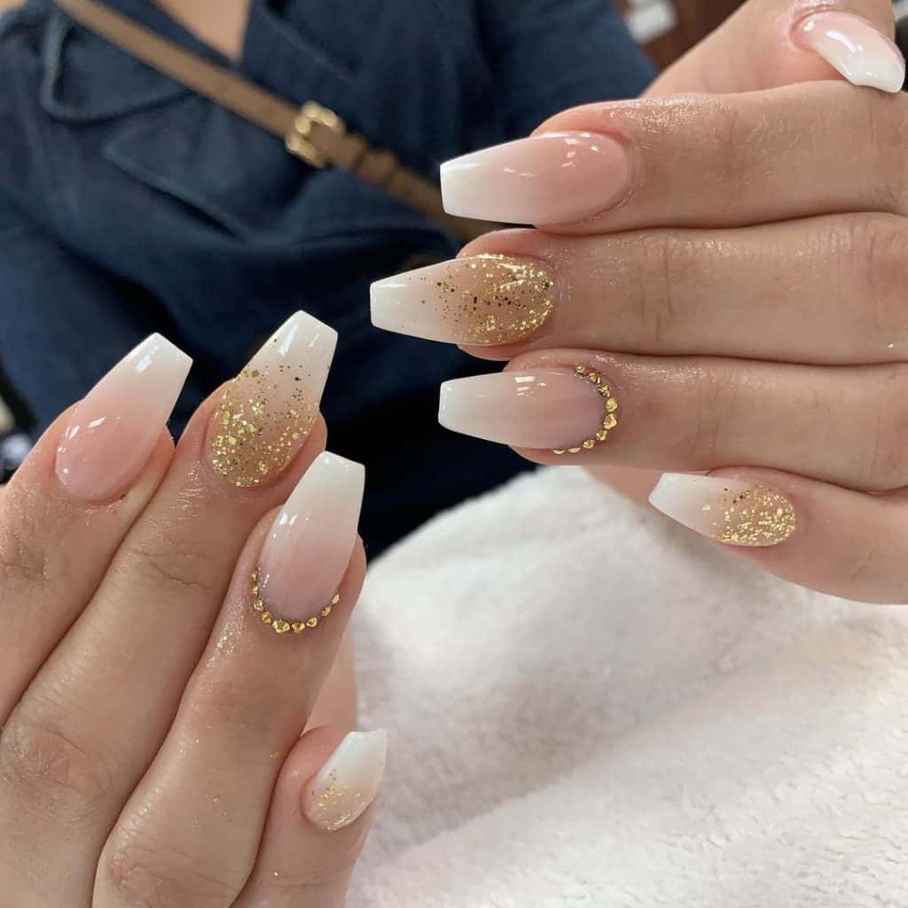 nail design with touch of gold glitters