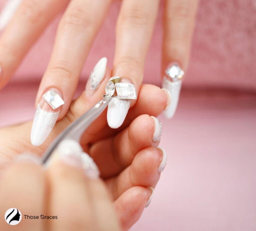 designing acrylic nails with cute stones
