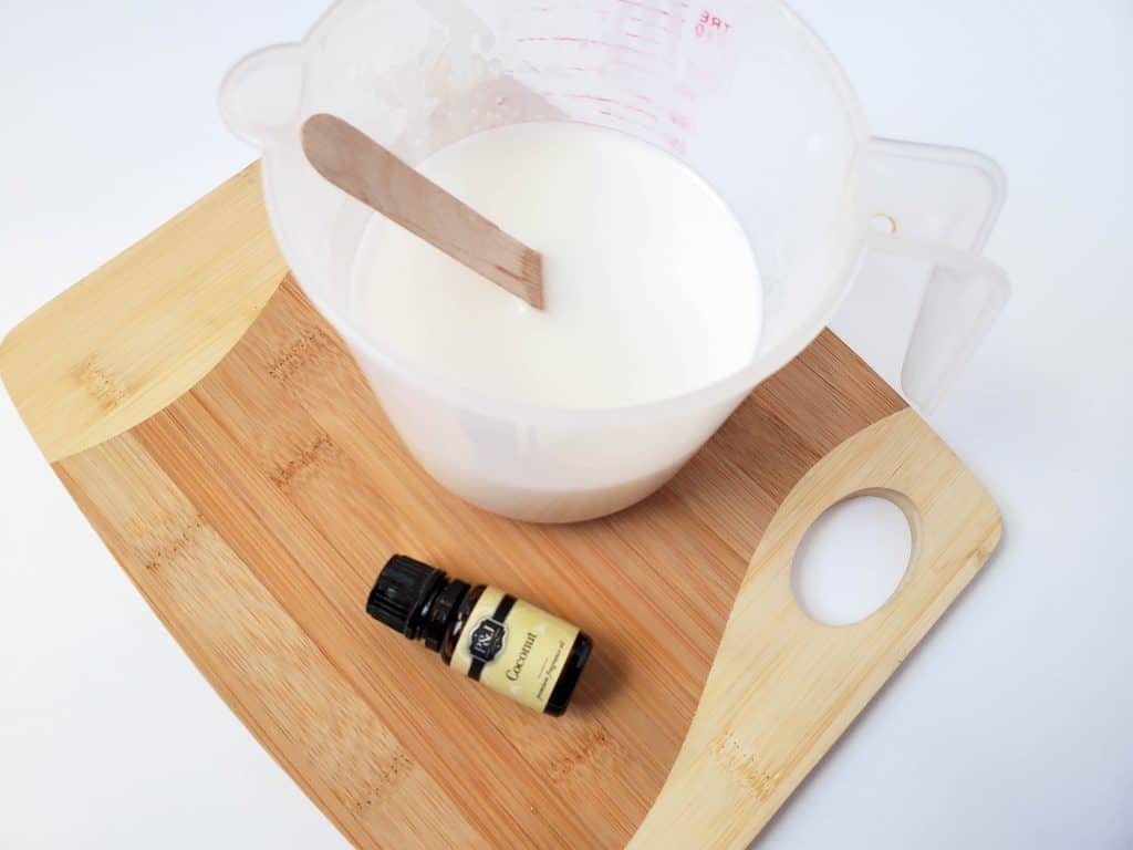 Coconut shampoo bar recipe step with melted ingredients and fragrance