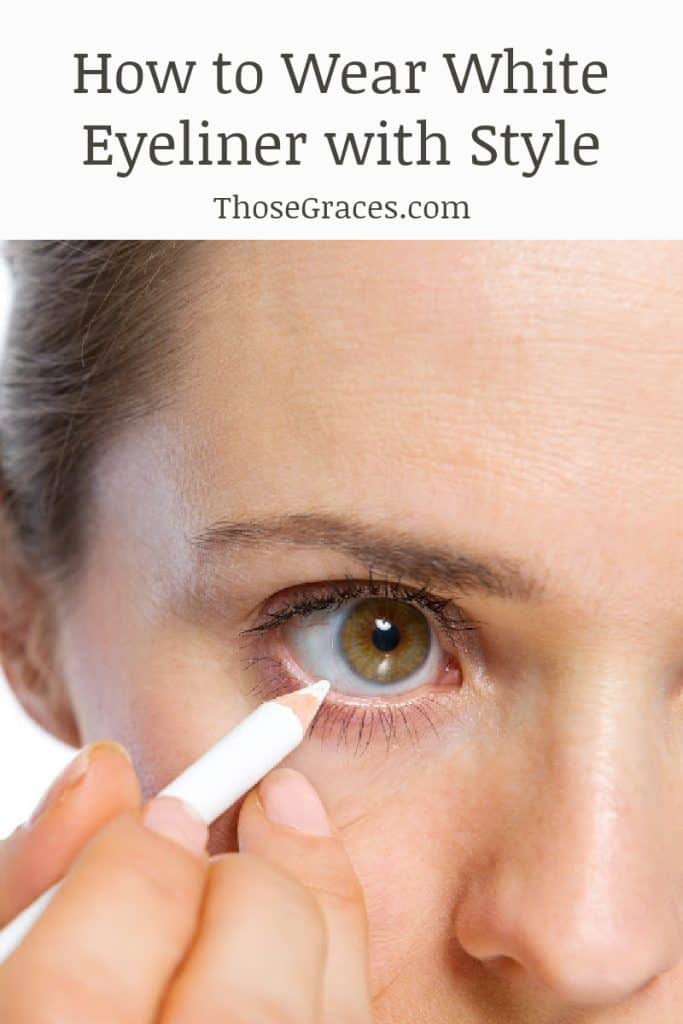 woman applying white eyeliner