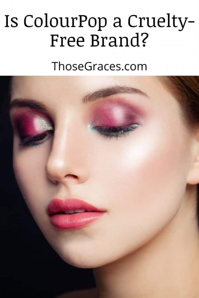 woman with colorful eyeshadows and light red lipstick