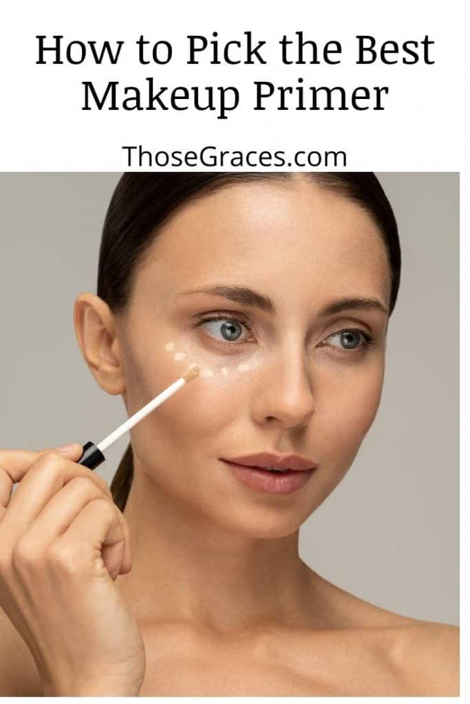 woman putting a makeup primer on her right under eye