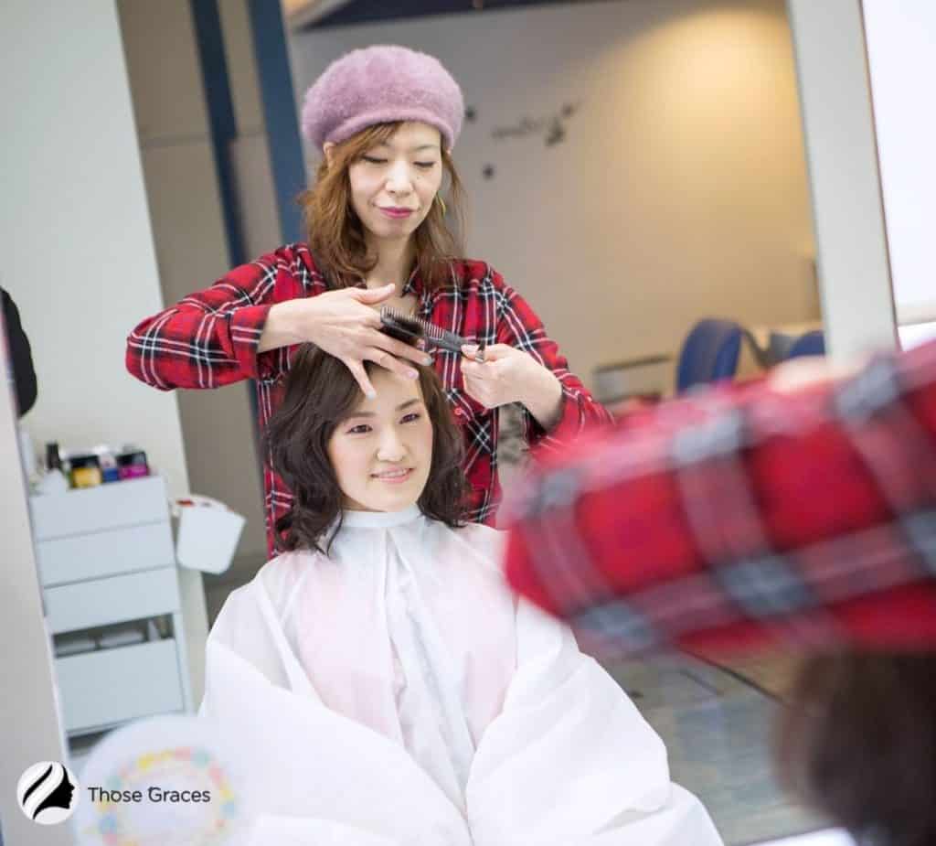 lady having a new haircut in a salon