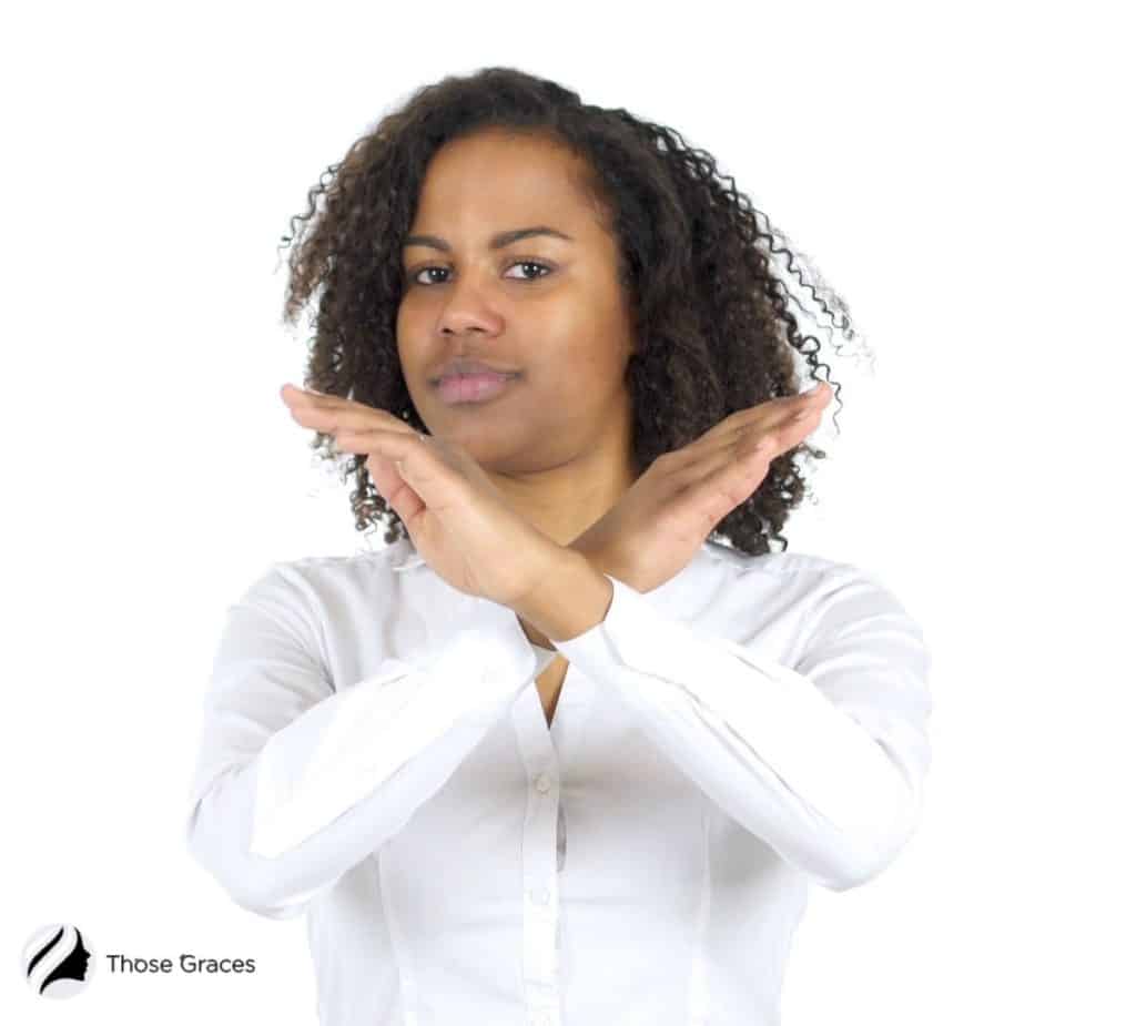 woman with an olive skin wearing a plain white shirt