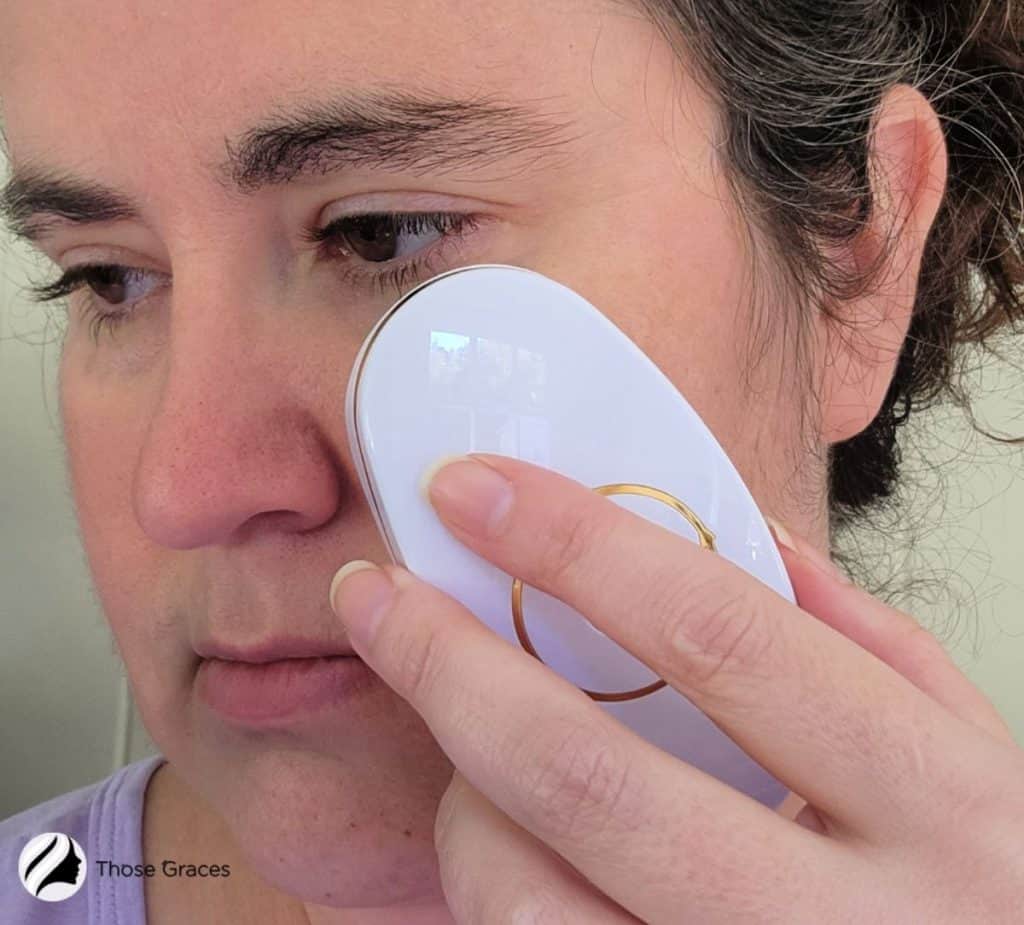 lady using ZIIP Beauty Nano Current device