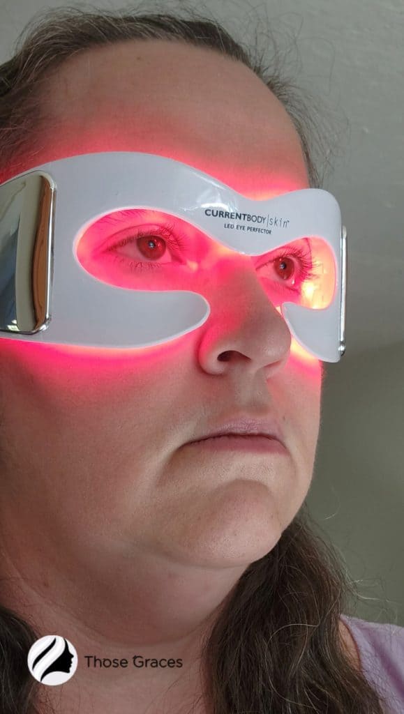 side view of a lady using CurrentBody's LED Eye Perfector