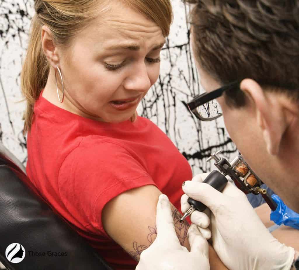 women tolerating tattoo pen but how to make a tattoo hurt less