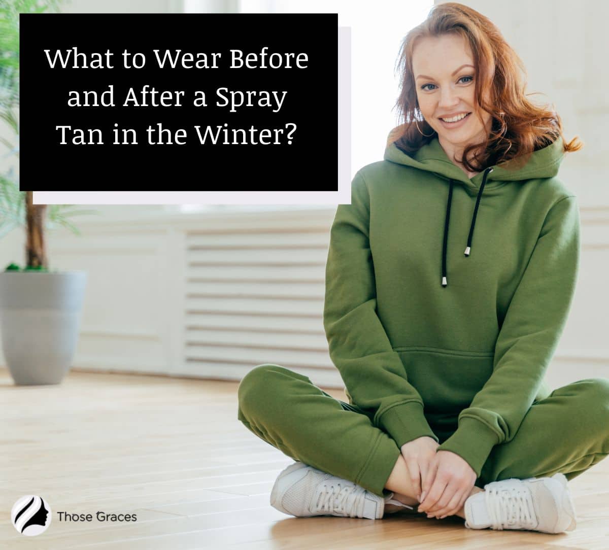 lady wearing dark green hoodie and pants for what to wear after a spray tan in winter