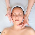 women getting face massage