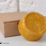 shampoo bar beside a recyclable box