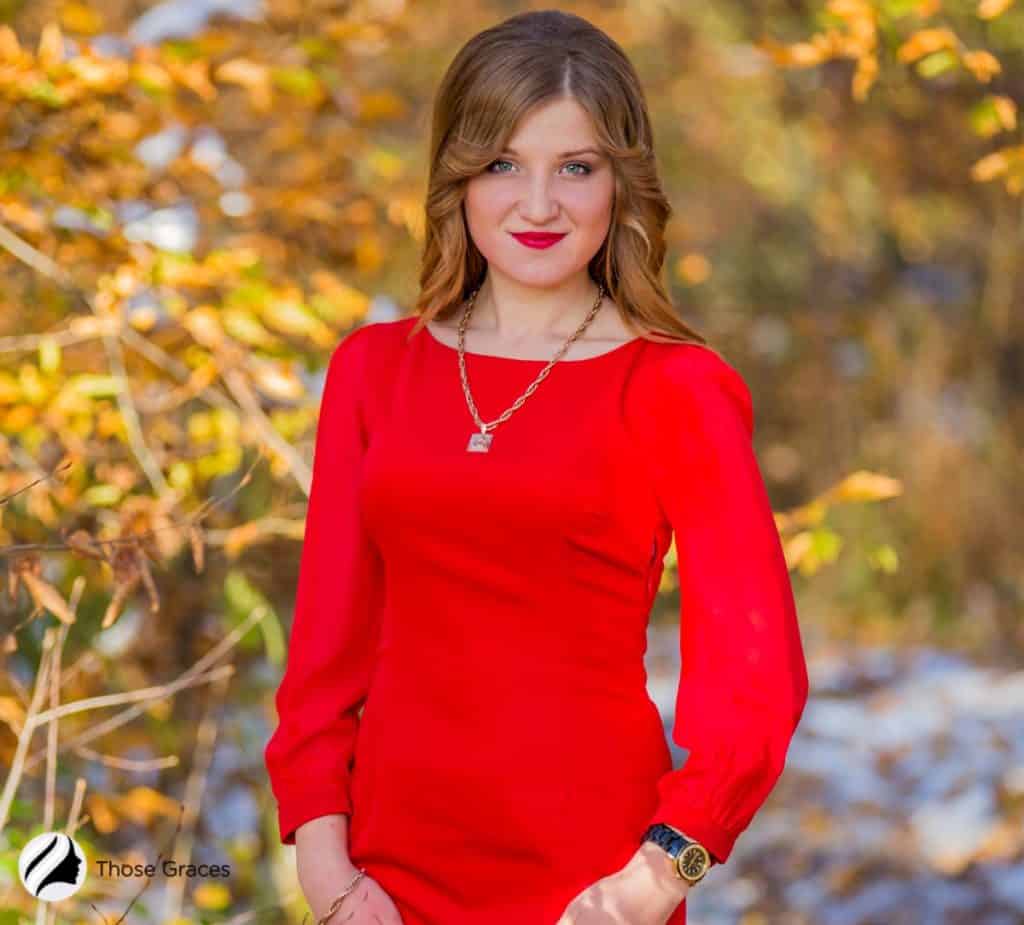 woman wearing a long sleeve red dress