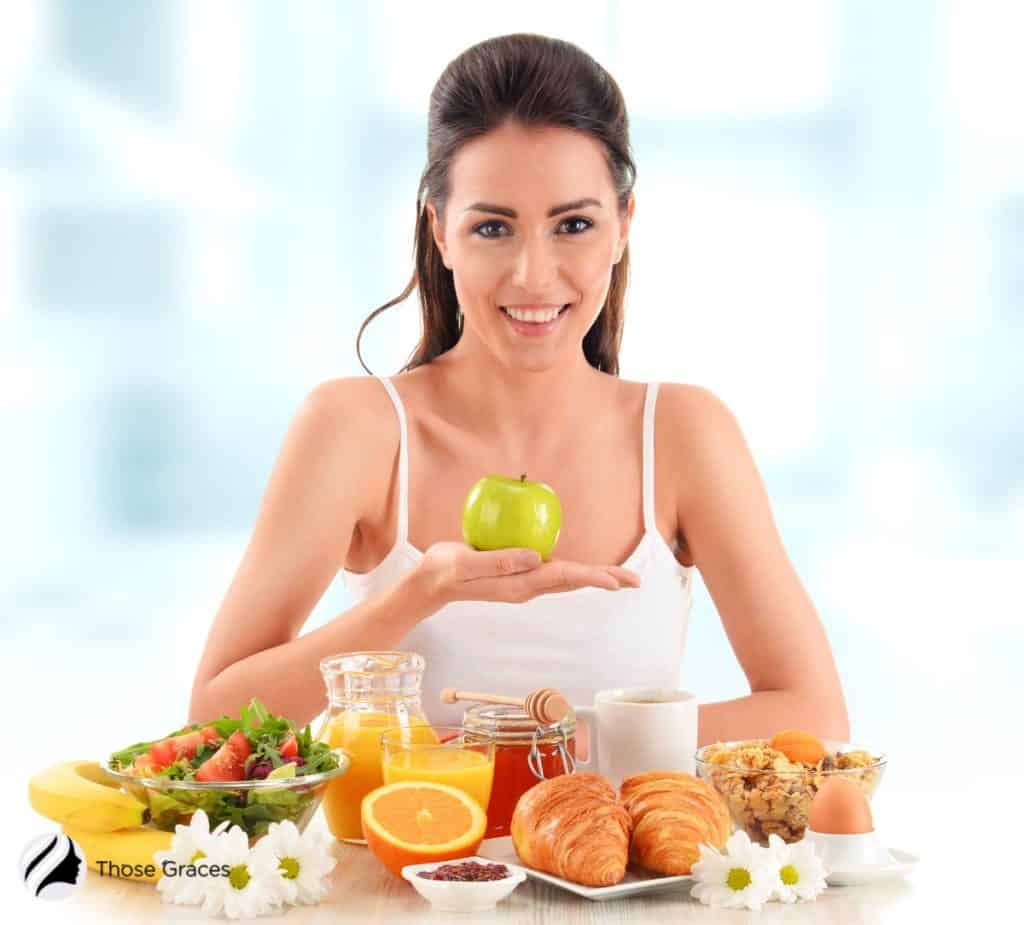 lady showing a balanced diet selection