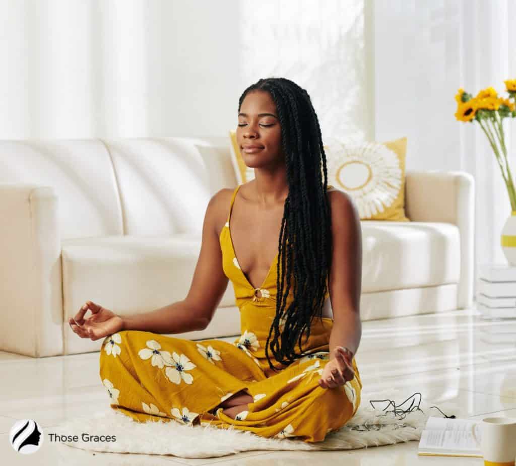 a beautiful black woman meditating