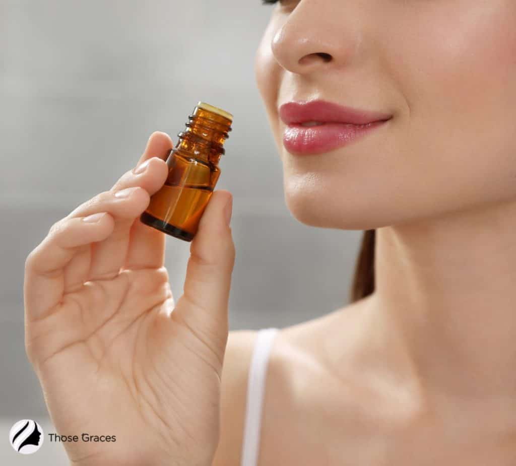 LADY INHALING ESSENTIAL OIL