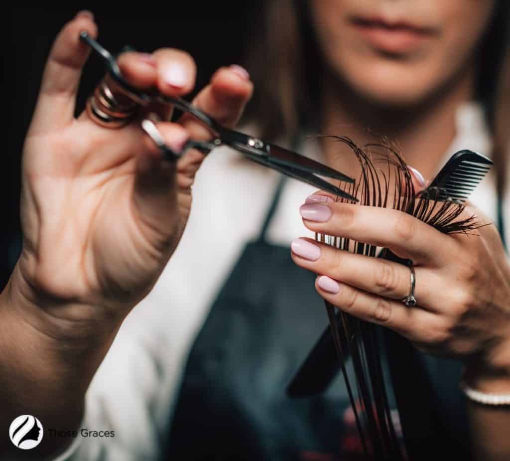 cutting the hair using a quality scissors