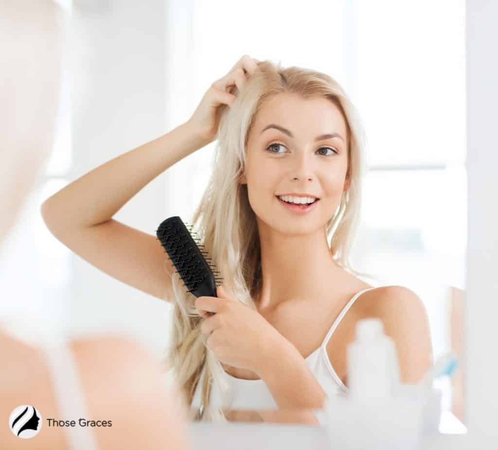 lady using a Hair Straightening Brush