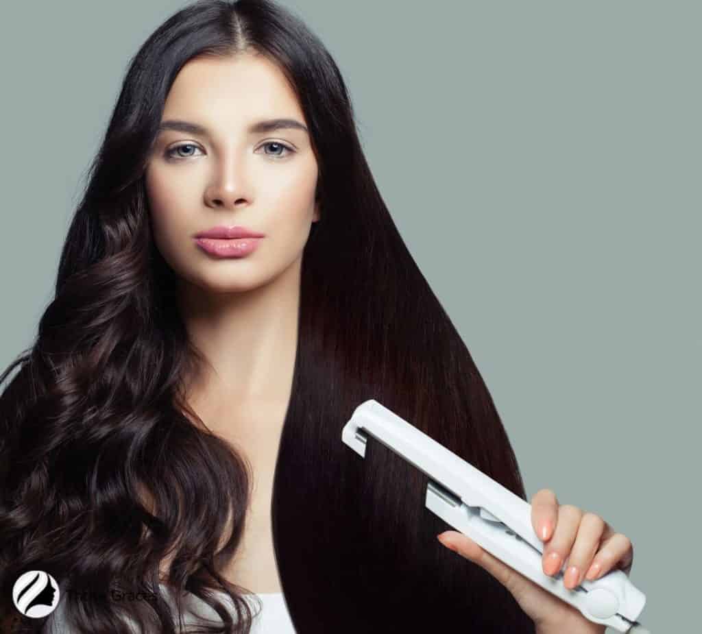 Lady using a flat iron