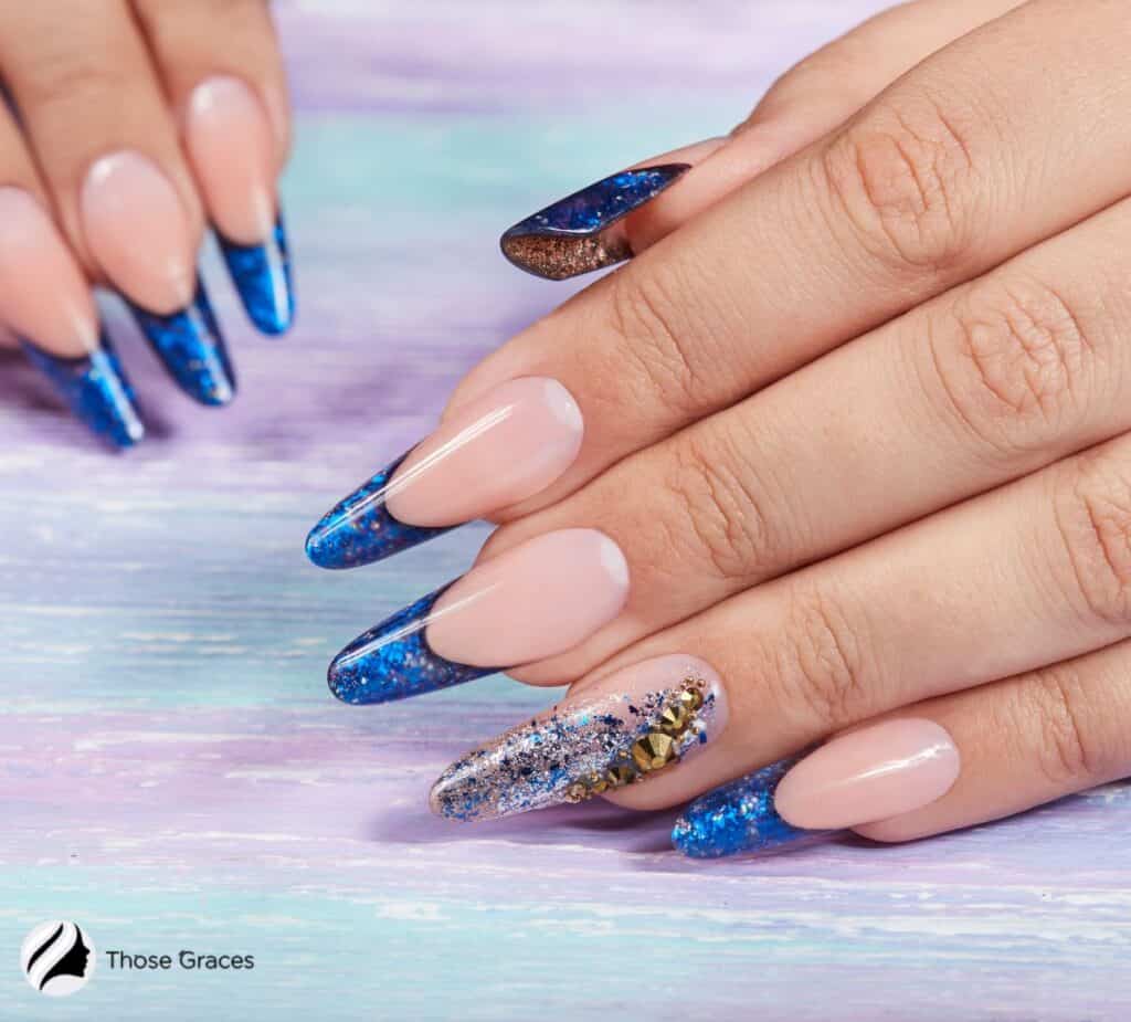 blue-colored nails with glitters and sparkles